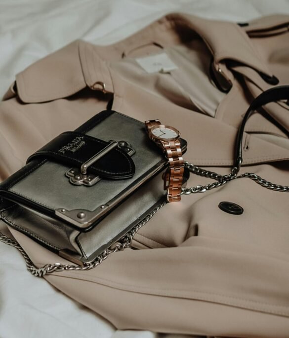 brown leather sling bag on white textile